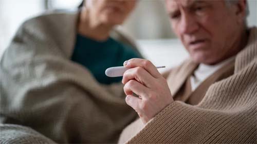 Determinar o que constitui febre e a melhor forma de verificar a temperatura corporal