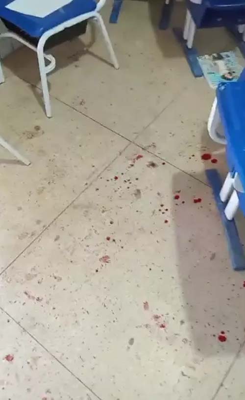 Estudante é baleado dentro de sala de aula; fotos mostram sangue e desespero dos alunos